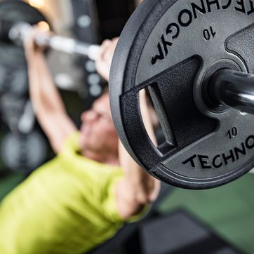 A man is lifting weights